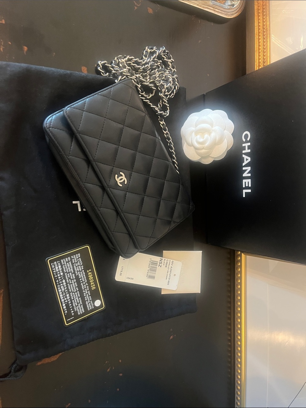 Authentic Chanel Classic WOC Black Quilted Lambskin Silver Hardware